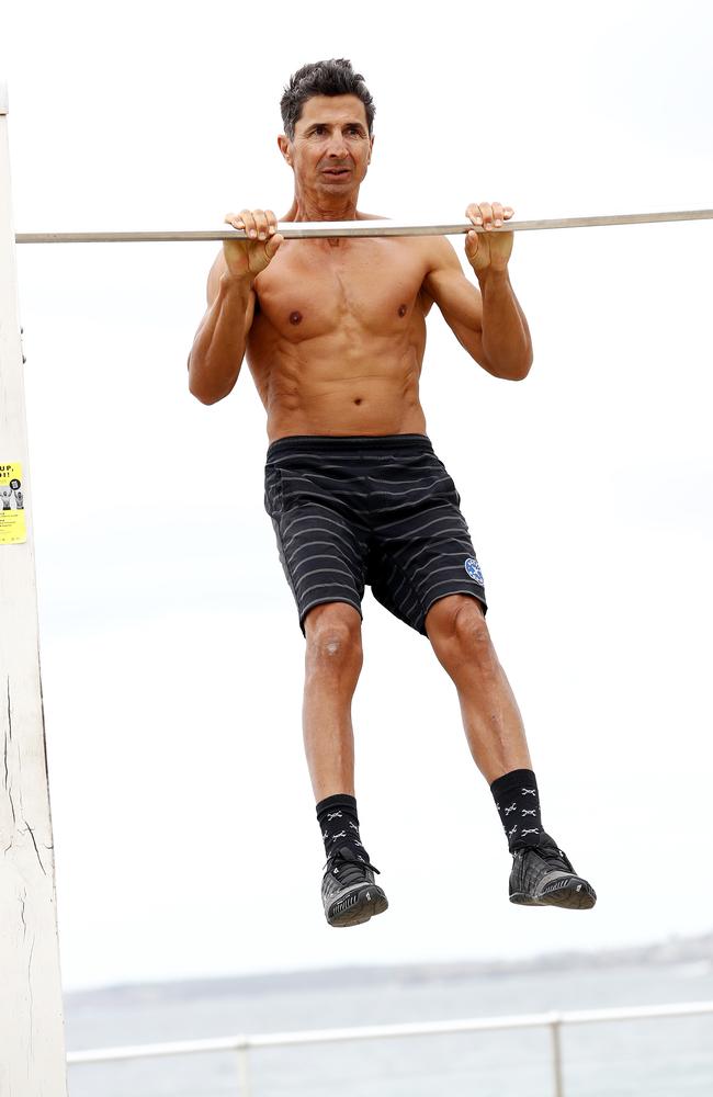 Marcus Bondi practises his chin ups at Bondi before tackling another world record. Picture: Sam Ruttyn