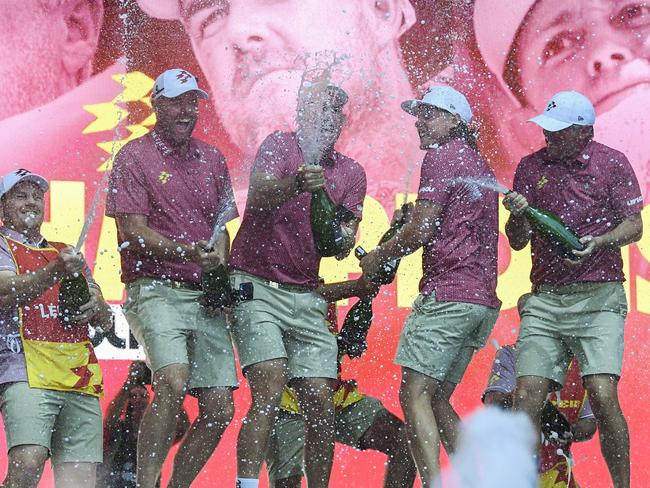 ADELAIDE, AUSTRALIA - APRIL 28:  Marc Leishman , Lucas Herbert ,Cameron Smith and  Matt Jones of the Ripper GC celebrate on stage winning the team trophy during LIV Adelaide at The Grange Golf Club on April 28, 2024 in Adelaide, Australia. (Photo by Mark Brake/Getty Images)