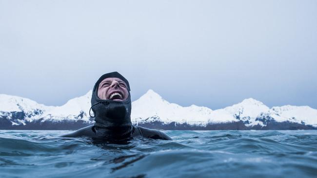 Mick Fanning gets to grips with surfing in Alaska in 2016. Picture: Rip Curl
