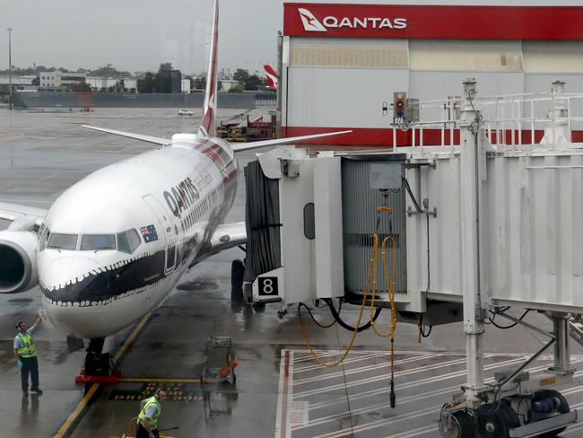 SYDNEY, AUSTRALIA - NewsWire Photos NOVEMBER 23, 2020: The plane for flight QF404 from Melbourne as it arrives at Sydney Airport. Borders open between Victoria and New South Wales today. Picture: NCA NewsWire / Damian Shaw