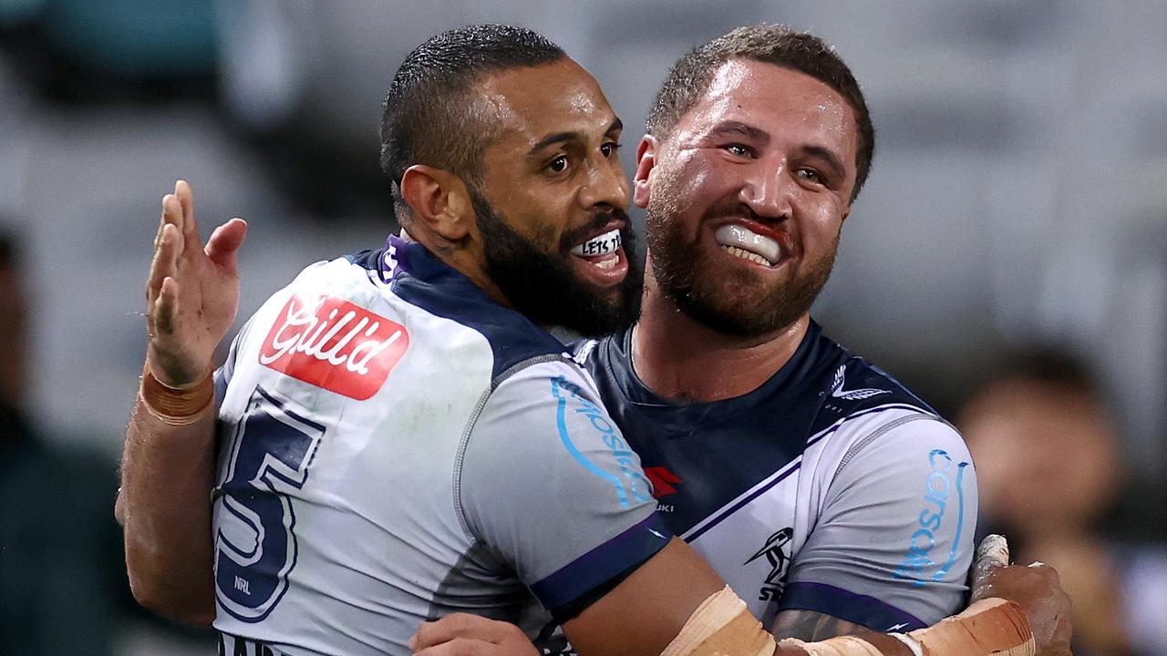 Josh Addo-Carr celebrates with Kenny Bromwich after scoring one of his four first-half tries. Picture: Cameron Spencer/Getty Images