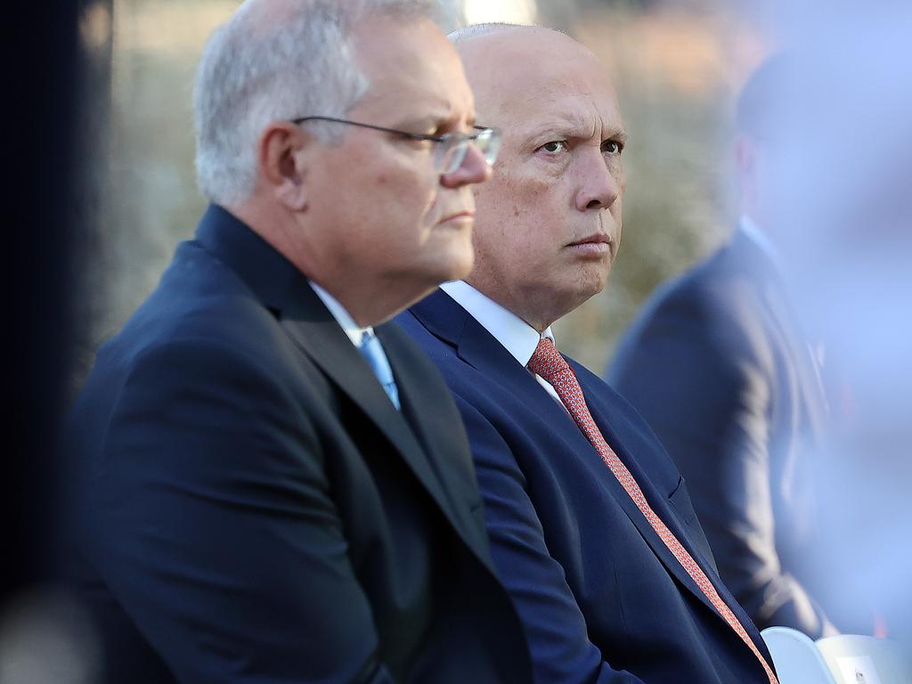 CANBERRA, AUSTRALIA NewsWire Photos FEBRUARY 16, 2022:**EXCLUSIVE**Prime Minister Scott Morrison and Defence Minister Peter Dutton attended a service for military nurses in Canberra. The Australian Service Nurses National Memorial commemorates past and present Australian Service nurses.Picture: NCA NewsWire / Gary RamagePicture: NCA NewsWire / Gary Ramage