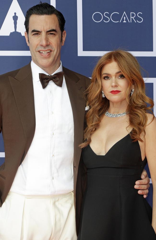 Sacha Baron Cohen in Ralph Lauren and Isla Fisher in Dior, watched the Oscars in Sydney. Picture: Getty Images