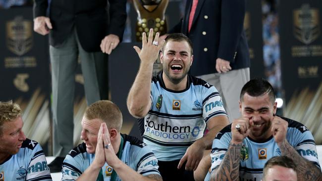 Shark's Wade Graham shows off his premiership ring after Cronulla won the 2016 NRL Grand Final between the Cronulla Sharks and Melbourne Storm at ANZ Stadium, Sydney. Picture: Brett Costello