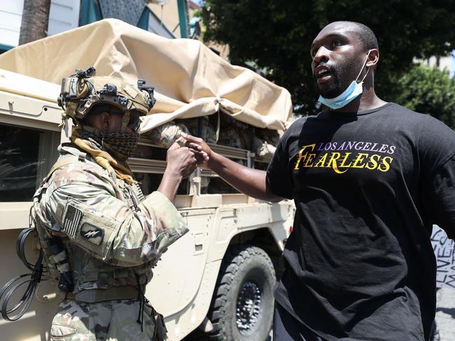 In many parts of the country, protesters urged some of the more provocative demonstrators to leave. Picture: Mario Tama