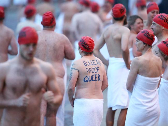 Swimmers on the beach after the swim. Picture: NIKKI DAVIS-JONES