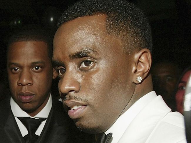 NEW YORK - JUNE 7 :  Janice Combs, Beyonce Knowles, Jay-Z and Sean "P. Diddy" Combs attend the Sean Jean/Zac Posen CFDA after-party at Marquee, on June 7, 2004 in New York City.  (Photo by Evan Agostini/Getty Images)