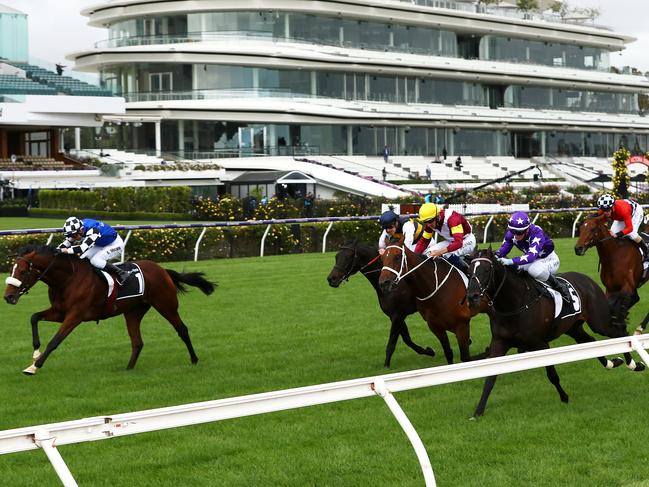 Whatever Kah — pictured at Flemington riding No.5, Sound — does or doesn’t do, it works. Picture: Getty Images