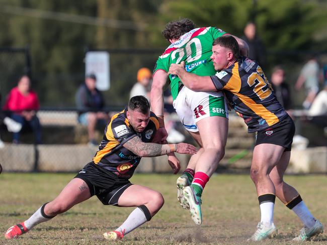 George Burgess bursting through the Tigers defence. Picture: Adam Wrightson Photography