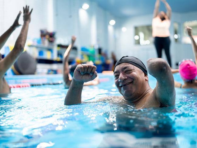 Portrait of a disabled senior man at swimming pool