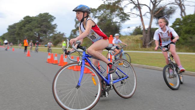 SCHOOLS TRIATHLON CHALLENGE, Bellerive Beach: Mikayla Cooper, of Collegiate competes in the bike leg of the grade 7 individual girls section