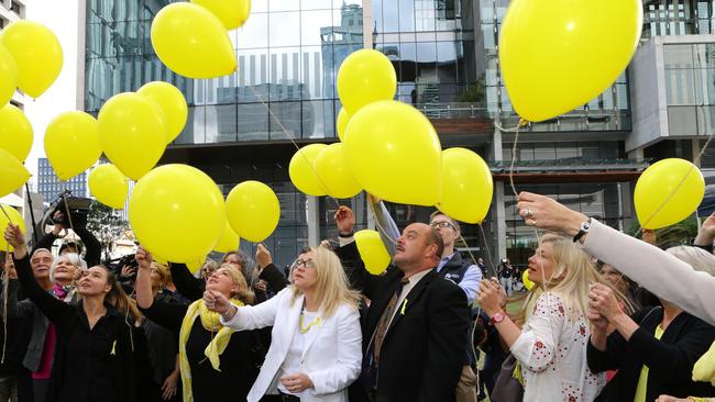 Family and friends of Allison Baden-Clay release yellow balloons to celebrate the guilty verdict of Gerard Baden-Clay murder trial. Pic Darren England.