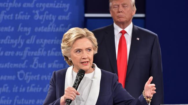 Clinton and Trump. AFP PHOTO / Paul J. Richards