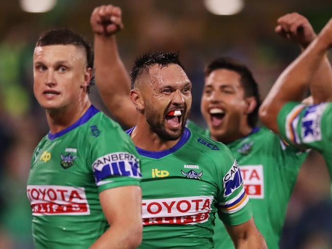 CANBERRA, AUSTRALIA - MARCH 26:   Jordan Rapana of the Raiders celebrates victory with team mates after the round three NRL match between the Canberra Raiders and the Gold Coast Titans at GIO Stadium, on March 26, 2022, in Canberra, Australia. (Photo by Matt King/Getty Images)