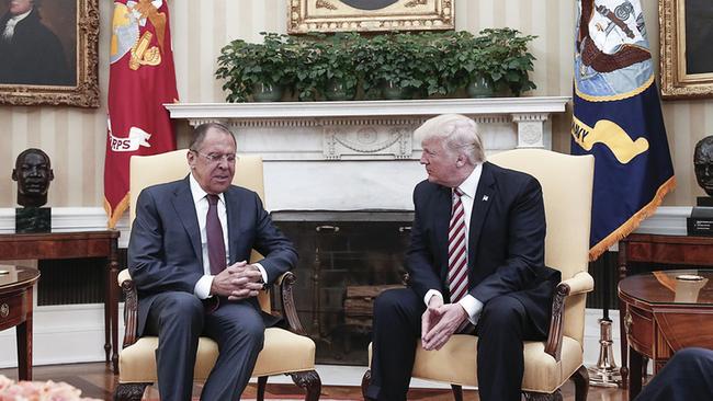 Trump and Lavrov get cosy in the Oval Office. American news media were banned from attending. Picture: AFP/Russian Foreign Ministry.