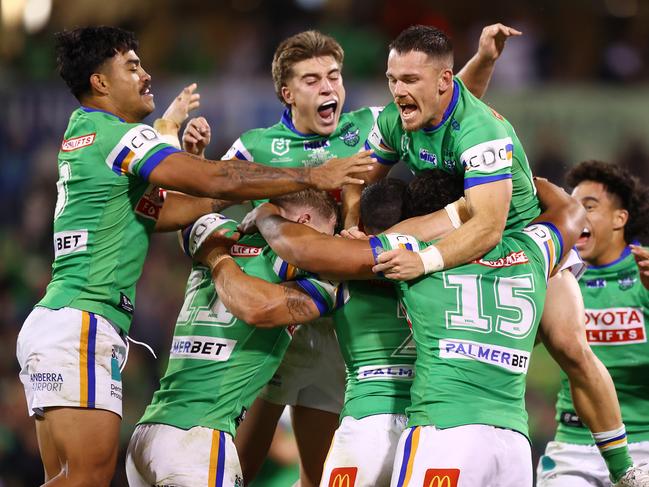 CANBERRA, AUSTRALIA – APRIL 14: Raiders players celebrate a field goal by Jamal Fogarty during the round six NRL match between Canberra Raiders and Gold Coast Titans at GIO Stadium, on April 14, 2024, in Canberra, Australia. (Photo by Mark Nolan/Getty Images)