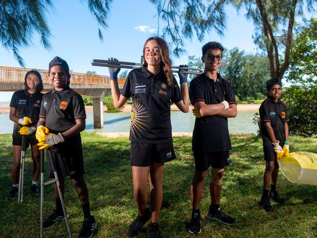 Nightcliff Middle School Clontarf and Stars program kids are out and about at Rapid Creek picking up rubbish for Clean Up Australia Day. Almaray Cadell, Lawrence Johnston, Ruby Mummery, Quentin Berto and Clarkson Johnston are stoked to get out of the classroom and into the outdoors.Photograph: Che Chorley