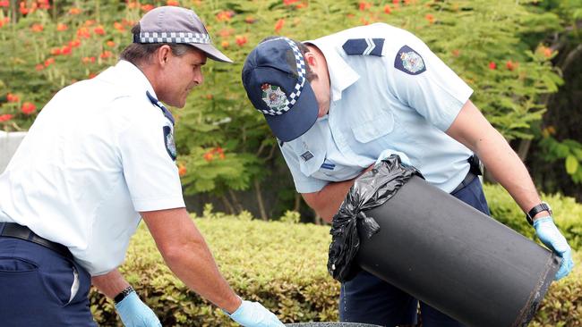 Police officers investigate after a bikie gang brawl at Royal Pines Resort. Picture: Michael Ross