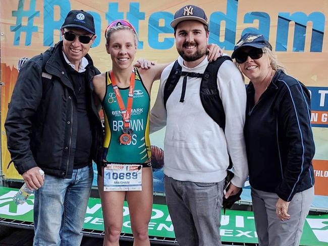 Maighan Brown with her parents and husband Braiden Marlborough after the ITU World Triathlon. Picture: Instagram