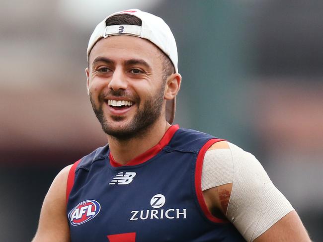 MELBOURNE, AUSTRALIA - MARCH 20: Christian Salem of the Demons reacts during a Melbourne Demons AFL training session at Gosch's Paddock on March 20, 2019 in Melbourne, Australia. (Photo by Michael Dodge/Getty Images)