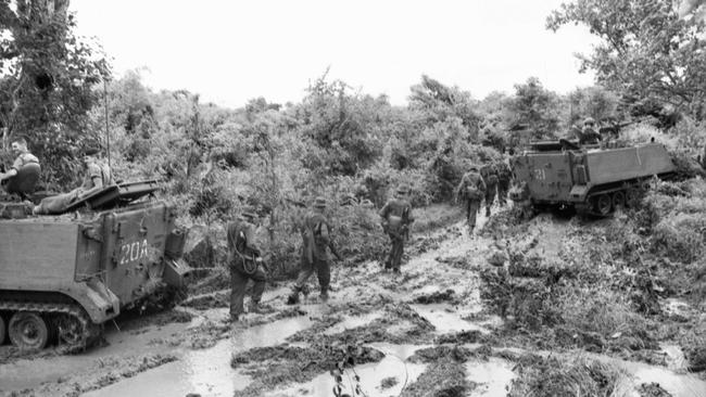 Australian soldiers post the pitched battle at Long Tan in Phuoc Tuy. Picture: Australian War Memorial