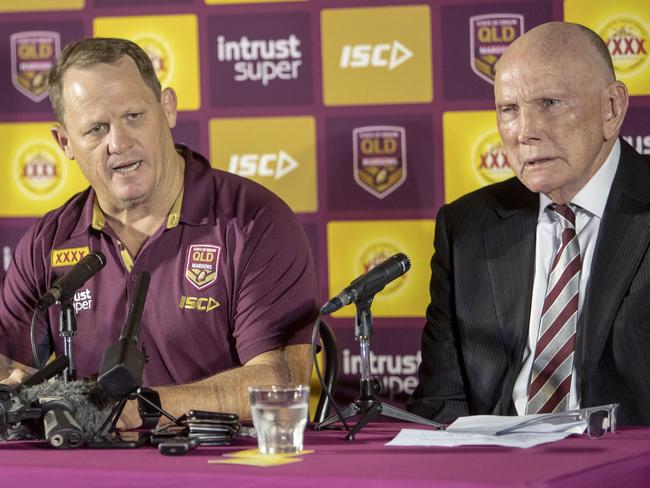 (L-R) Chairman of selectors Gene Miles, Maroons coach Kevin Walters and Queensland Rugby League chairman Bruce Hatcher unveil the 2018 Maroons team for June 6's State of Origin opener in Melbourne at XXXX Brewery Ale House in Brisbane, Monday, May 28, 2018. (AAP Image/Glenn Hunt) NO ARCHIVING