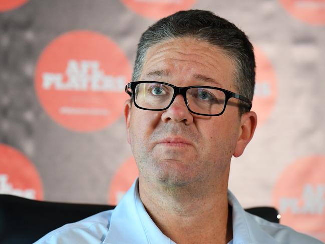 The AFL Players' Association (AFLPA) CEO Paul Marsh addresses the media on the AFLPA Boards position regarding COVID-19 during a press conference at AFLPA Office in Melbourne, Tuesday, March 17, 2020. Marsh has announced that both AFL and AFLW playing groups are prepared to play as soon as they are given the green light by the AFL. (AAP Image/James Ross) NO ARCHIVING