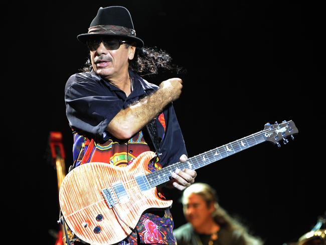 Carlos Santana performs on stage during his 2008 German tour.