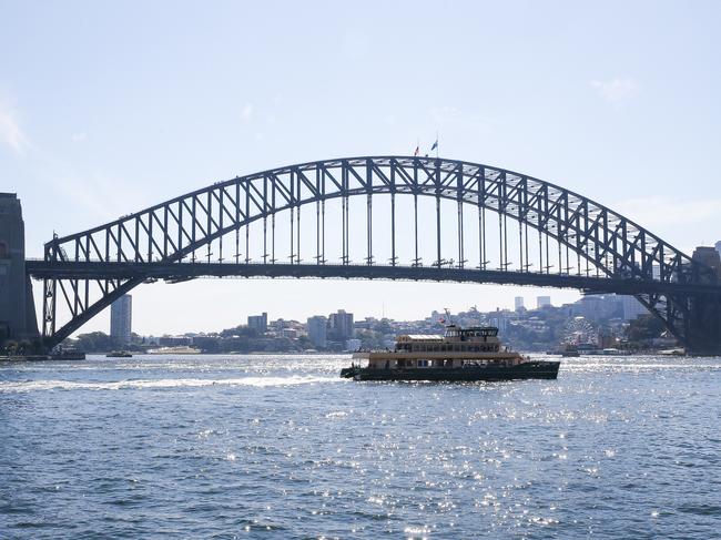 SYDNEY, AUSTRALIA: Newswire Photos : APRIL 15 2024: A view of the flags on the Sydney Harbour Bridge at half mast today in honour of the victims who were tragically lost their lives and for those injured and involved in the Bondi Westfields Shopping Centre massacre on Saturday. Picture: NCA Newswire / Gaye Gerard