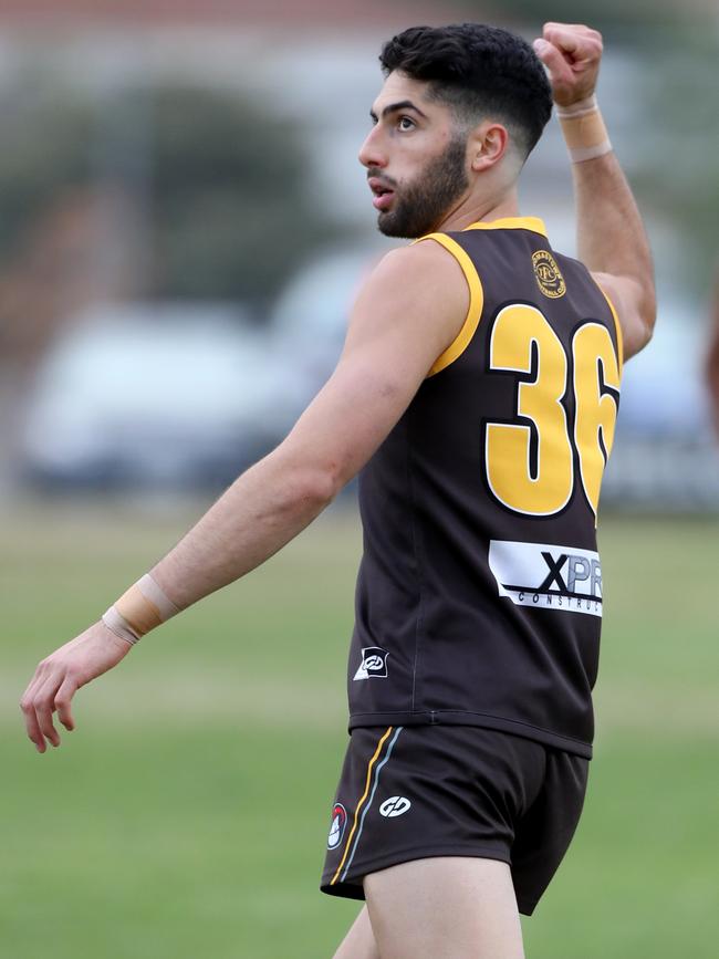 Benjamin Nesci celebrates a goal for Thomastown.