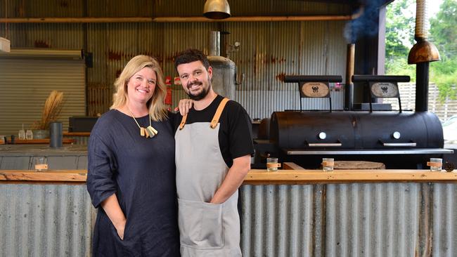 Red Bum BBQ owners Martin and Melissa Goffin in front of their pit smoker. Picture: Nicki Connolly