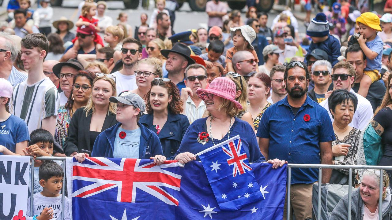 Jacob Dwyer-Hobbler and Jenny Dheurie were among thousands lining Adelaide St in Brisbane for the 2023 Anzac Day March. Picture: NCA NewsWire / Glenn Campbell