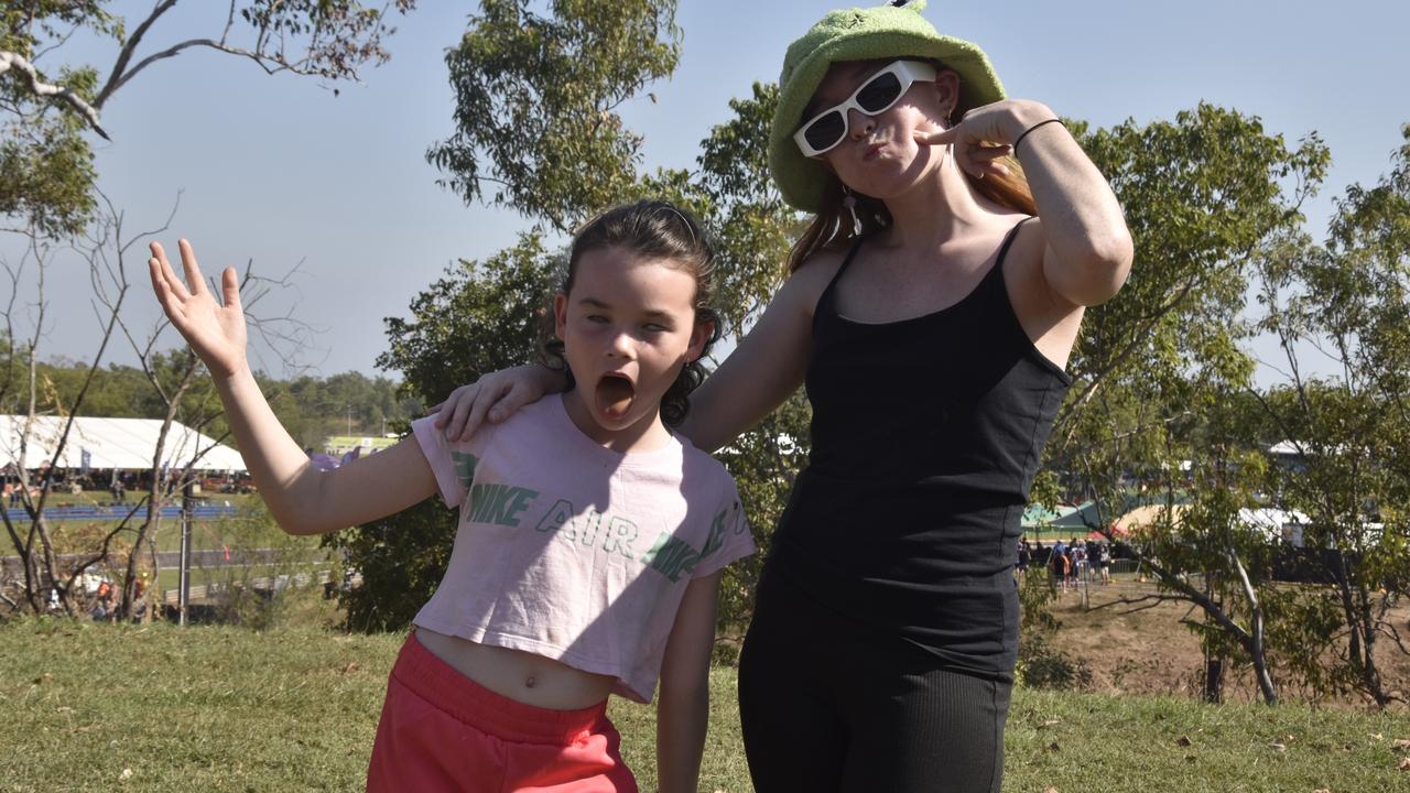 Essie, 8, and Brianna Dark, 19, at the 2023 Darwin Supercars. Picture: Fia Walsh