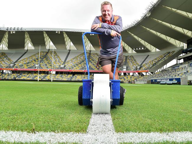 Queensland Country Bank Stadium Grounds Manager Bruce Fouracre making history line marking at the new stadium. Picture: Shae Beplate.