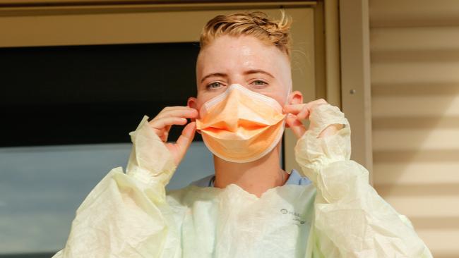 Clinical Nurse Theresa Clasquin conducts PPE drill at the NCCTRC/AUSMAT sections of the Howard Springs Corona virus quarantine Facility on the outskirts of Darwin in The Northern Territory. Picture GLENN CAMPBELL