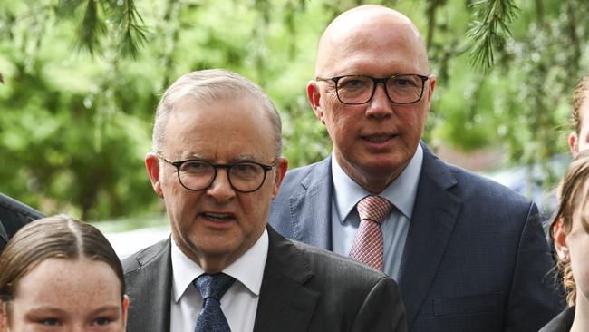 Opposition Leader Peter Dutton and Prime Minister Anthony Albanese at St Andrews Presbyterian church in Canberra. Picture: NCA NewsWire / Martin Ollman