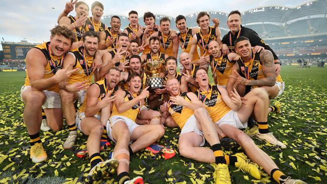 Tigers players celebrate after winning the SANFL Grand Final match between Norwood and Glenelg at the Adelaide Oval in Adelaide, Sunday, September 22, 2024. (SANFL Image/David Mariuz)