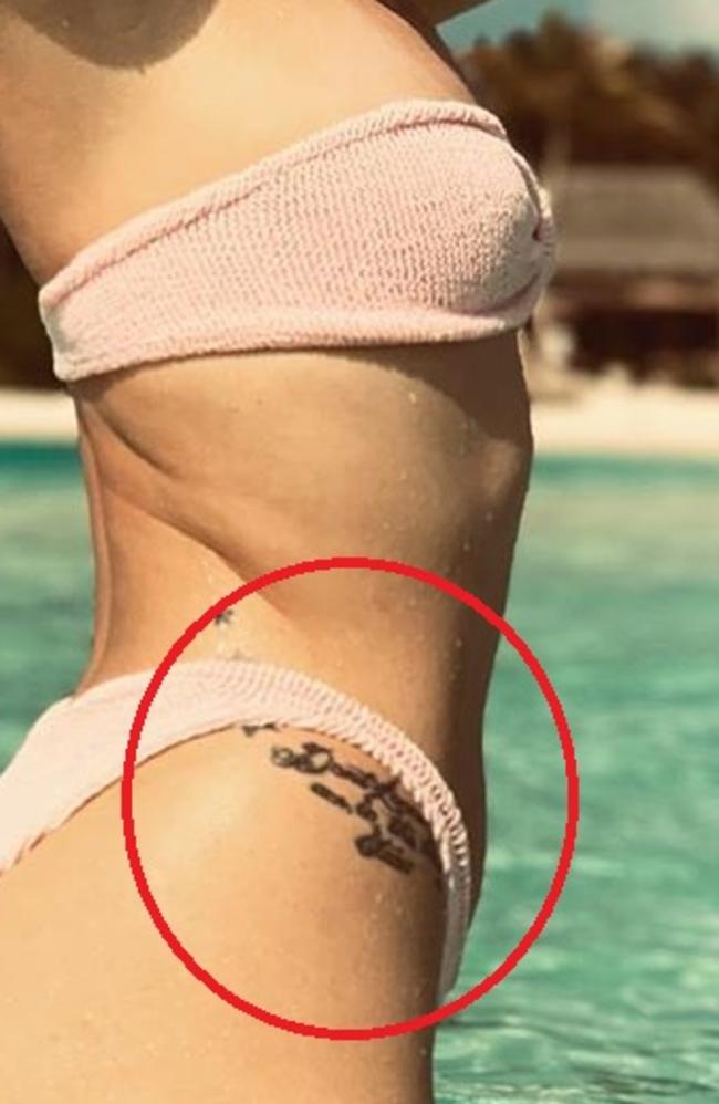 Jessie J defends misspelled tattoo and 'small boobs' in bikini photo