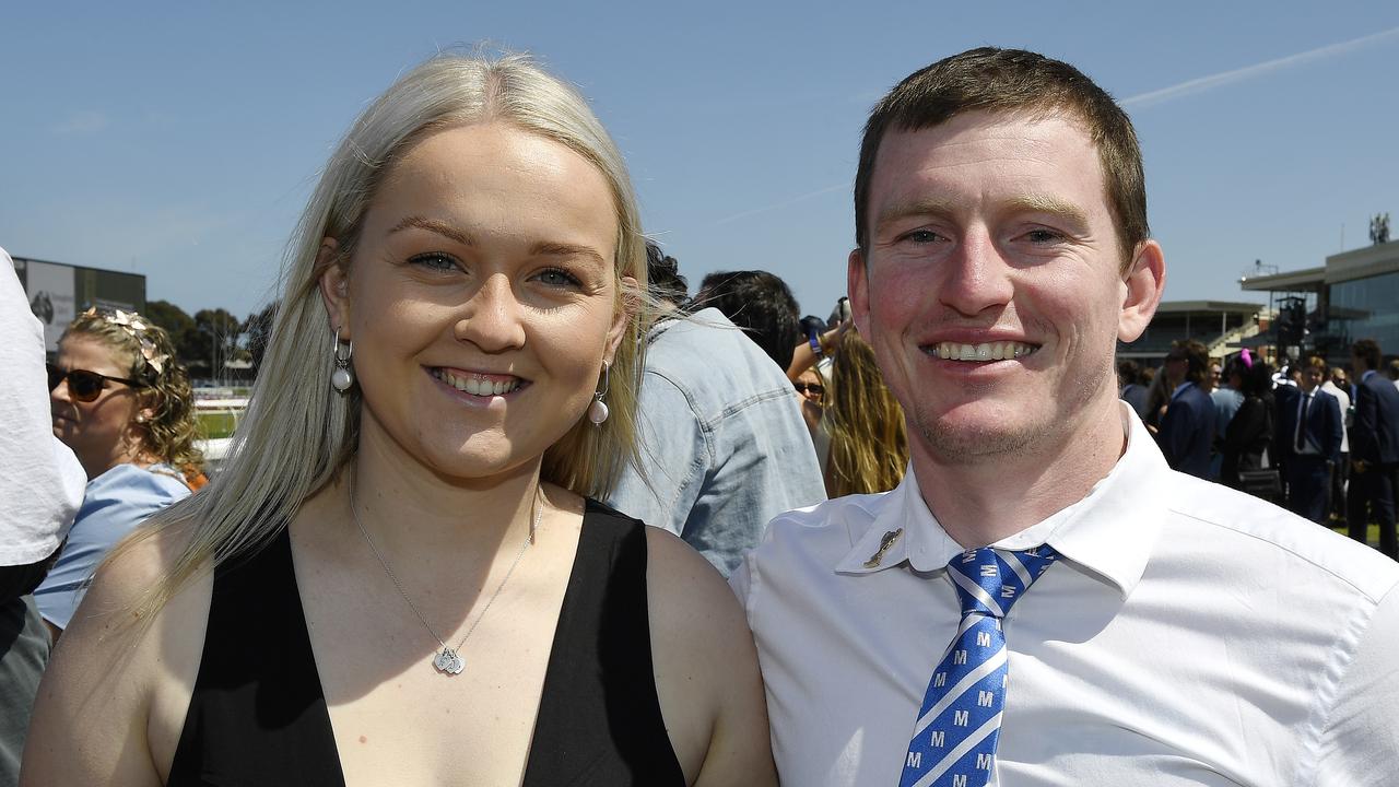 Caulfield Guineas horse race meeting, Caulfield, Victoria, Saturday 12th October 2024. Faces in the crowd. Pictured enjoying the race meeting are Allie and Damien. Picture: Andrew Batsch