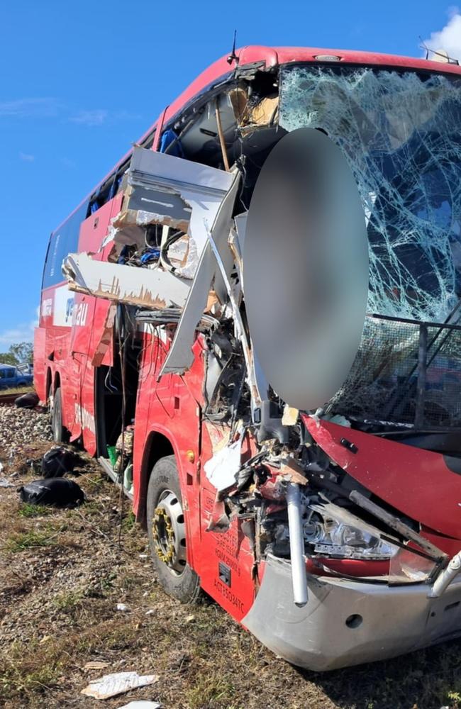 A photograph taken in the immediate aftermath of a horror fatal Greyhound passenger bus crash at Gumlu on the Bruce Highway south of Ayr.