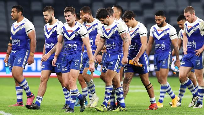 SYDNEY, AUSTRALIA - JULY 03: The Bulldogs look dejected as they leave the field after being defeated 66 - 0 during the round 16 NRL match between the Canterbury Bulldogs and the Manly Sea Eagles at Stadium Australia, on July 03, 2021, in Sydney, Australia. (Photo by Mark Kolbe/Getty Images)