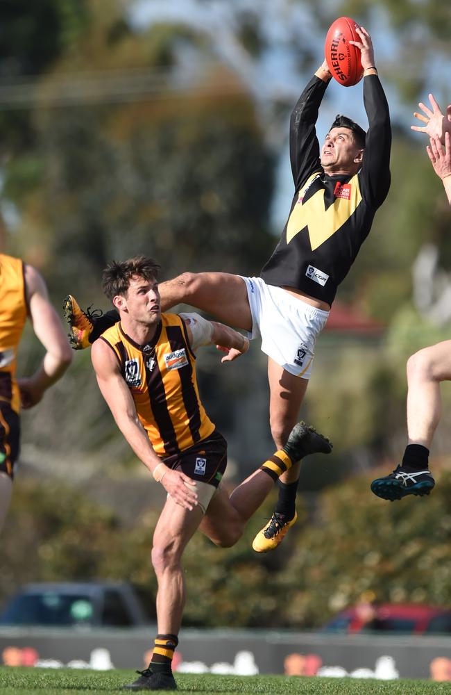 Robin Nahas takes a spectacular mark in the forward pocket for Werribee. Picture: Lawrence Pinder