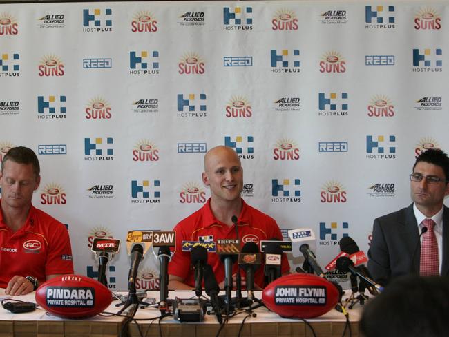 Gary Ablett’s press conference at Crown Casino to announce he is leaving Geelong for the Gold Coast Suns, with coach Guy McKenna and CEO Travis Auld.