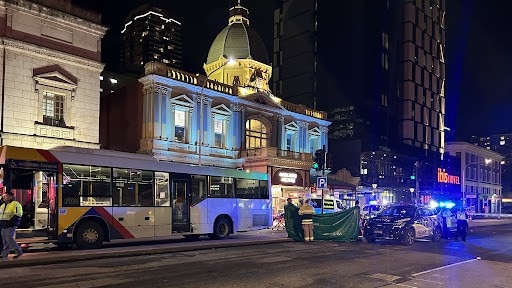 A bus has struck a pedestrian on Grenfell St, Adelaide