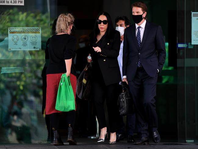 Nicole Crisp, girlfriend of Gold Coast criminal lawyer Campbell MacCallum, leaves the Magistrates Court in Brisbane. Picture: Dan Peled/NCA NewsWire