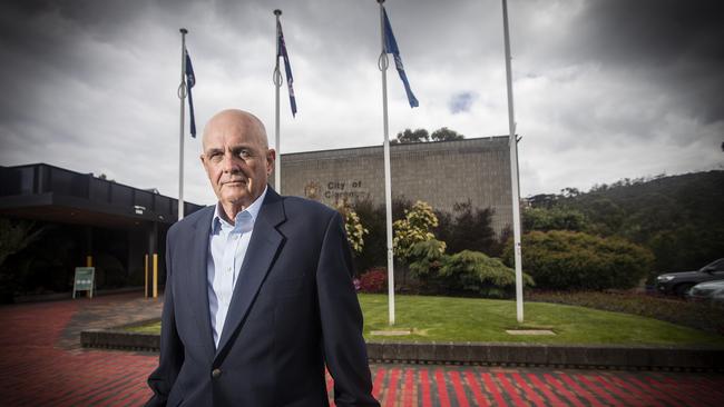 Clarence City Council Mayor Doug Chipman in front of the flagpoles outside the council's chambers. Picture: LUKE BOWDEN