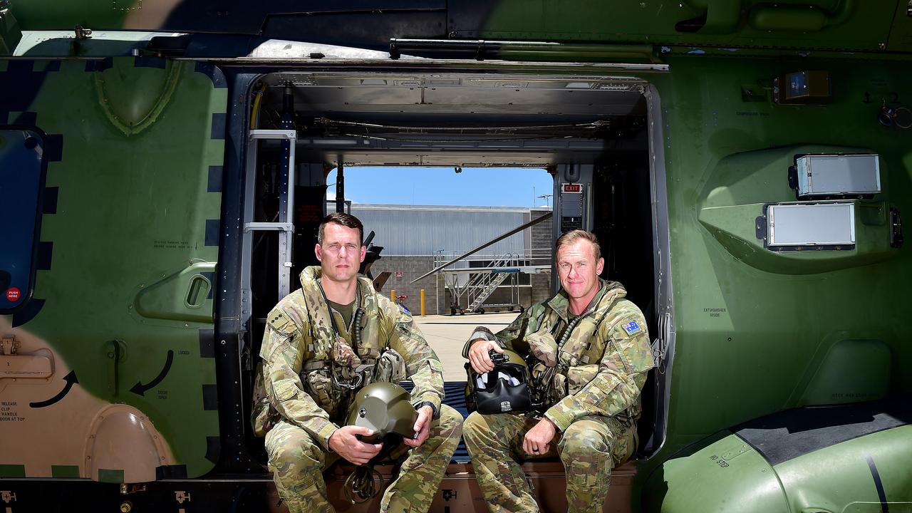 MRH-90 Taipan helicopter Pilot Captain Leon Botham and Aircrewman Sergeant Kieran Dan from the 5th Aviation Regiment in Townsville. Picture: Shae Beplate.