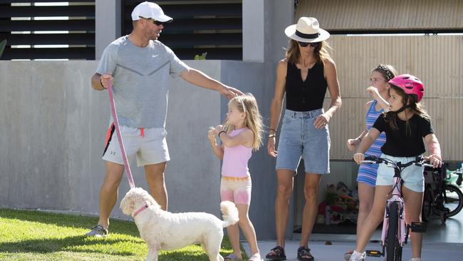 The Warners outside their Maroubra home this morning. Picture: Monique Harmer