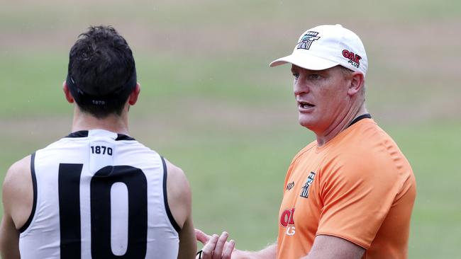 Port Adelaide assistant coach Michael Voss talking to Travis Boak. Picture: Sarah Reed