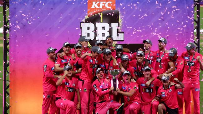 Let’s get this party started: The Sixers celebrate with the trophy after winning the Big Bash League final against the Perth Scorchers at the Sydney Cricket Ground.